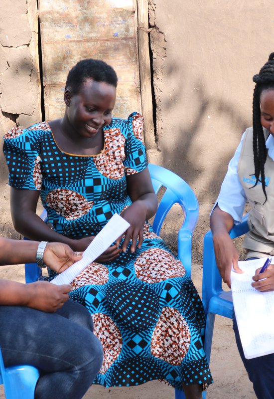 beneficiary_sharing_her_story_with_the_TPO_staff.JPG